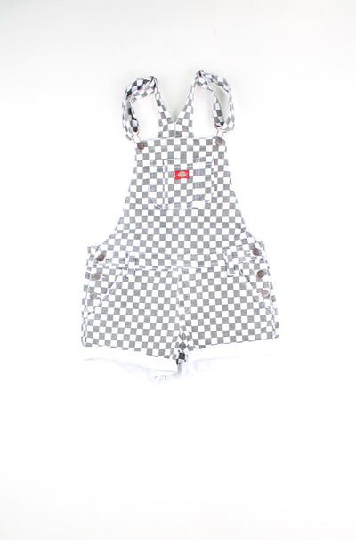 Black and white checker board Dickies dungaree shorts with multiple pockets and logo on the chest pocket 