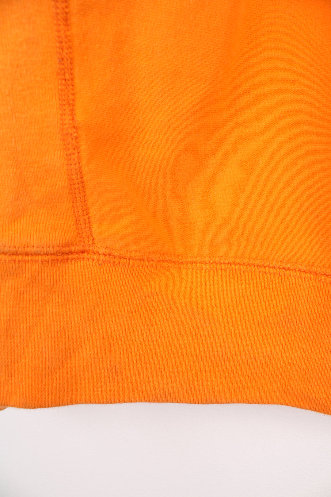 Supreme x Playboy 100% cotton hoodie in orange, made in Canada. Features embroidered spell-out logo across the chest