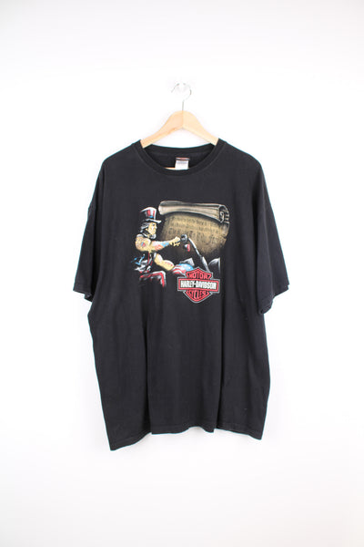 2013 Harley Davidson t-shirt in black with printed Abraham Lincoln riding a motorcycle print on the front and "Montgomery Alabama" print on the back. good condition Size in Label: Mens XXL - Measures more like an XL