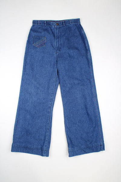 Vintage 1970's Wrangler jeans. High waisted with flared legs and rainbow stitching on the pockets. good condition  Size in Label:  No size - measures like a womens M (please see measurements below)
