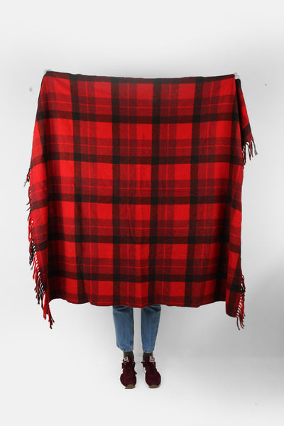 Vintage Pendleton check/ plaid wool blanket in red and a greenish black colourway. Made from 100% virgin wool and features fringe down two of the sides. good condition  Size in Label: Width: 51 inches Length: 59 inches 