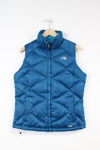 The North Face 550 bright blue double pocket satin gilet with embroidered logo on the front & back