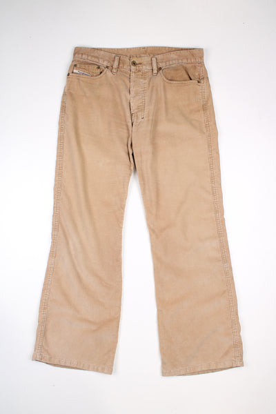 Diesel mid rise bootcut trousers in tan cord.  good condition  Size in Label:  32 (L)