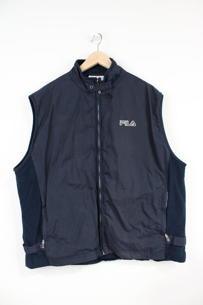 Vintage navy blue Fila, zip through sporty gilet with embroidered logo on the chest and zip up pockets