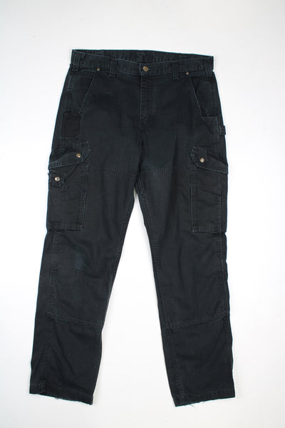 Black Carhartt 100% heavy duty cotton, double knee carpenter trousers with multiple pockets and signature logo on the back pocket