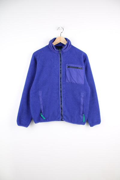 Vintage 80's Patagonia Fleece in a purple colourway, full zip up, and has multiple pockets.