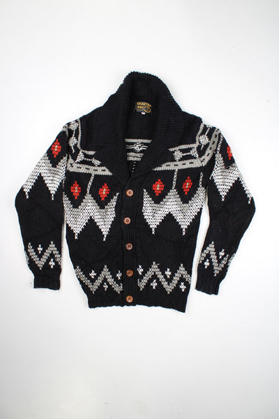 Vintage 60's black knit cardigan with red cross stitch design. Made by Charter Oak from 100% virgin Acrylic. Closes with wooden buttons.   good condition  Size in Label:  Size M