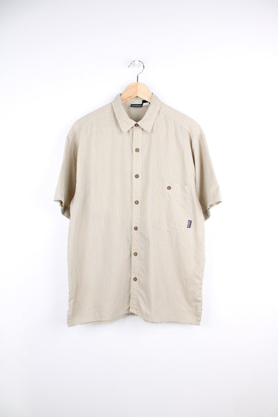 Patagonia Short Sleeve Plaid Shirt in a yellow and grey colourway, button up, chest pocket and has the logo embroidered on the front.