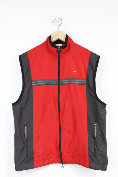 00s red Nike lightweight zip through gilet, with swoosh embroidered logo on the front