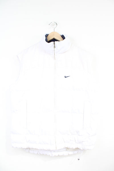 00's Nike all white gilet with embroidered swoosh logo on the chest and foldaway hood
