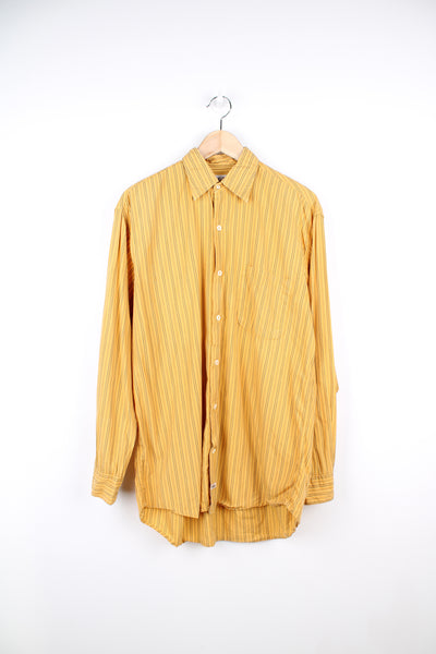 Vintage yellow pinstripe CP Company button up shirt. Features small branded tab on the front near the hem. good condition - small hole near the bottom left hem (see photos) Size in Label: Label Faded - Measures like a mens L