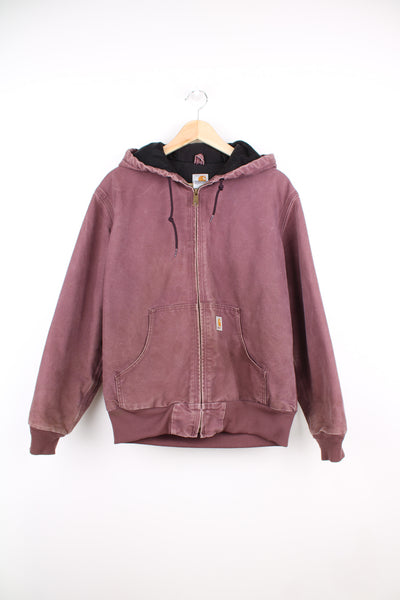 Carhartt Active Jacket in a purple colourway, heavy cotton lining, zip up, hooded and has the logo embroidered on the pocket.