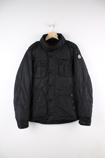 Vintage Moncler black puffer coat with fold away hood, embroidered badge on the sleeve and zip up pockets  good condition   Size in Label:  N/A- Measures like a S (see measurements below)
