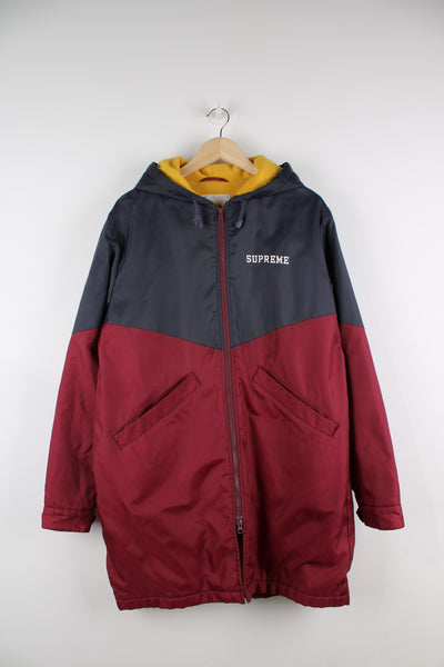 F/W 2012 Supreme Sideline Jacket. Fleece lined bench coat with full zip, hood and Supreme lettering printed on the front and back.  good condition - a repair has been made to the seam under the armpit. A name has been written in the name tag.  Size in Label:  L