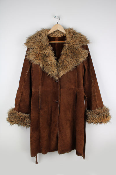 Vintage brown Y2K Afghan jacket with faux fur  cuffs and collar. Made from real suede, closes with buttons down the front and belt. good condition   Size on Label:  Women's XL
