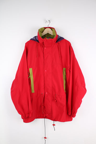 Vintage Timberland Weathergear jacket in a red colourway, zip up, side pockets, hooded and has embroidered logo on the front.