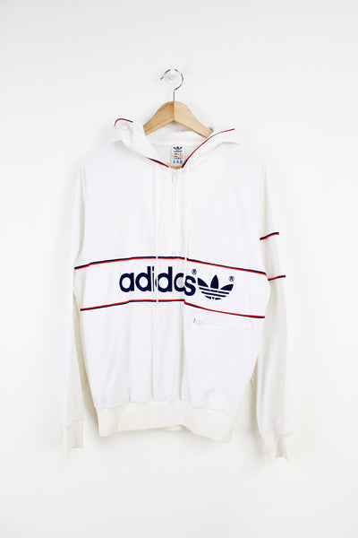 Vintage West German 1980's Adidas  hoodie with raised spell-out logo across the chest and  1/4 zip fastening