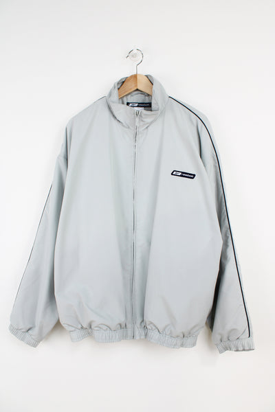 Vintage Reebok light grey zip through track top with embroidered logo on the chest 