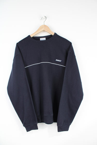 Navy blue Reebok sweatshirt with embroidered spell-out logo on the chest