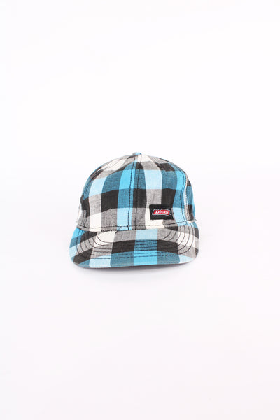 Dickies blue and black plaid baseball cap with embroidered Dickies logo on the front. Has an adjustable strap at the back