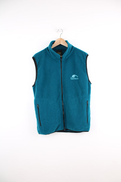 Helly Hansen Fleece Vest in a blue colourway, zip up, side pockets, and has the logo embroidered on the front.