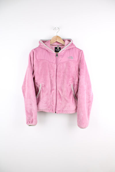 The North Face Hooded Fleece in a pink colourway, zip up, size pockets and has the logo embroidered on the front and back.
