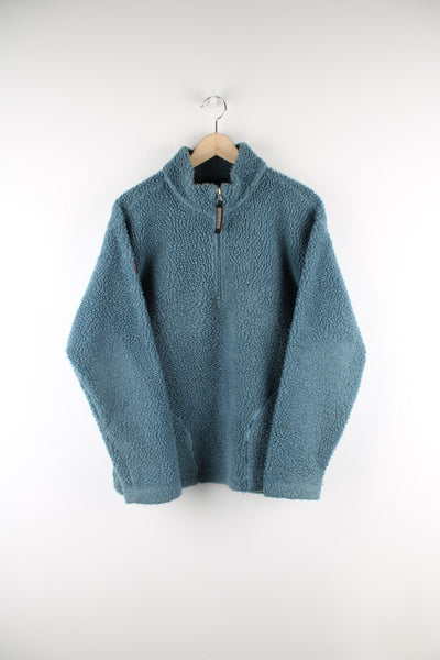 Blue Napapijri teddy style pullover fleece with 1/4 zip and embroidered logos on the arms and two front pockets.  good condition  Size in label:  Mens L - Measures more like a M
