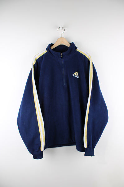 Adidas blue with yellow three stripe details 1/4 zip fleece with embroidered logo on the chest and drawstring waist