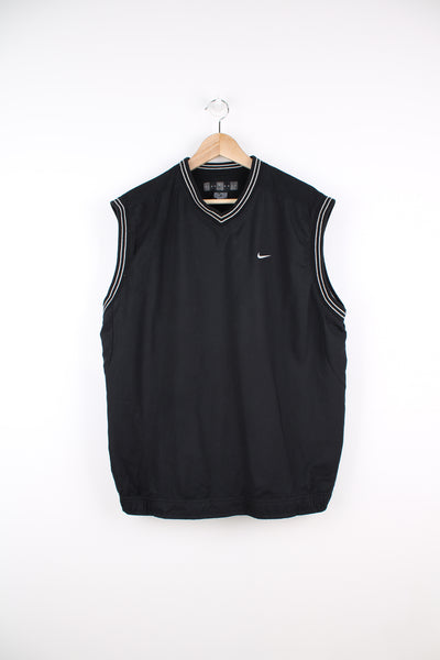 Nike Lightweight Golf Vest in a black colourway, v neck, mesh lining, and has the swoosh logo embroidered on the front.