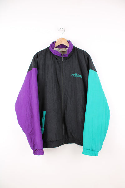 Vintage Adidas Lightweight Jacket in a black, purple and green colourway, zip up, side pockets, insulated, and has the logo printed on the front and back.