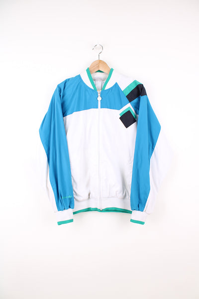 Vintage Adidas Tracksuit Jacket in a white and blue colourway, zip up, side pockets, and has the logo embroidered on the right sleeve.