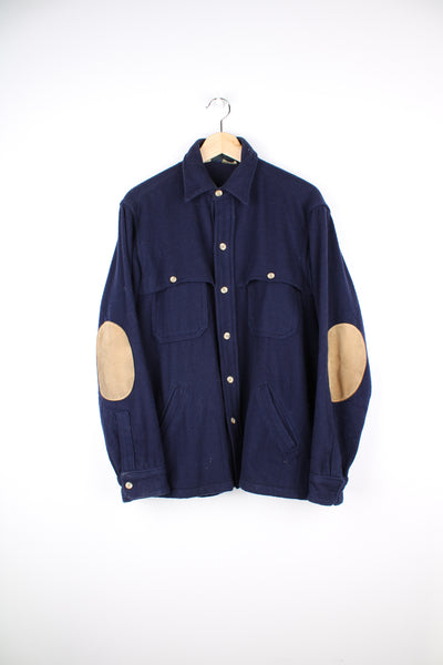 Vintage navy blue Woolrich flannel button up over shirt with double pockets and suede elbow patches