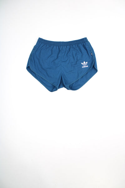 Blue Adidas sports shorts with embroidered logo on the leg and elasticated waistband. good condition Size in Label: Mens 34 (L)
