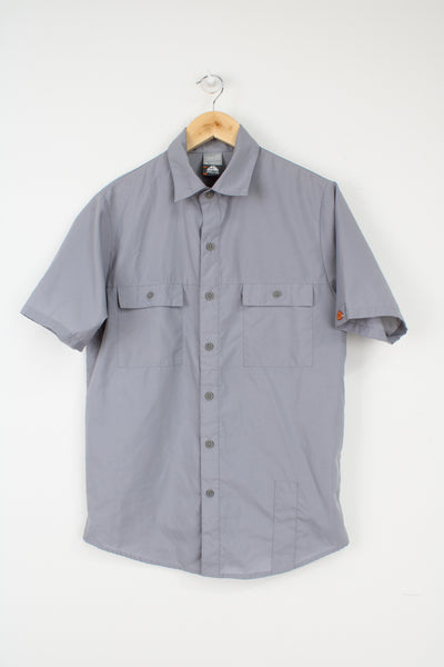 Nike ACG all grey button up short sleeve shirt with logo on the sleeve
