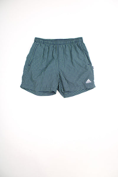 Blue and green check shorts by Adidas with embroidered logo on the leg and elasticated waistband. good condition Size in Label: Mens 36" (XL)