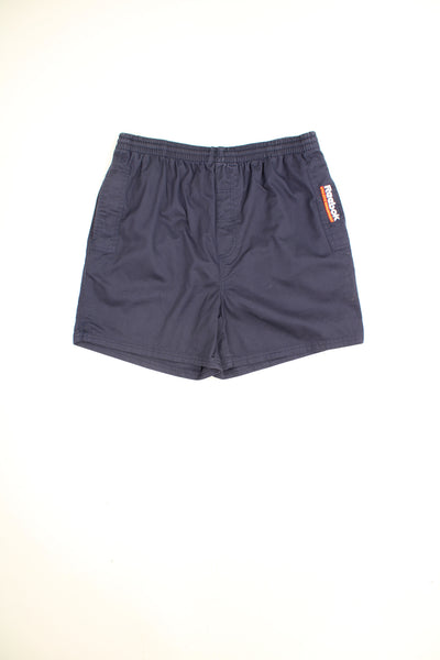 Navy blue Reebok shorts with embroidered logo on the leg and elasticated waistband with drawstring. good condition - elastic in the waistband isn't has stretchy as it once was (can still be tightened with the drawstring)Size in Label: Mens M 