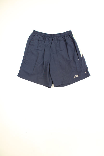 Navy blue Umbro sports shorts with embroidered logo on the leg and elasticated waistband. good condition Size in Label: Mens M