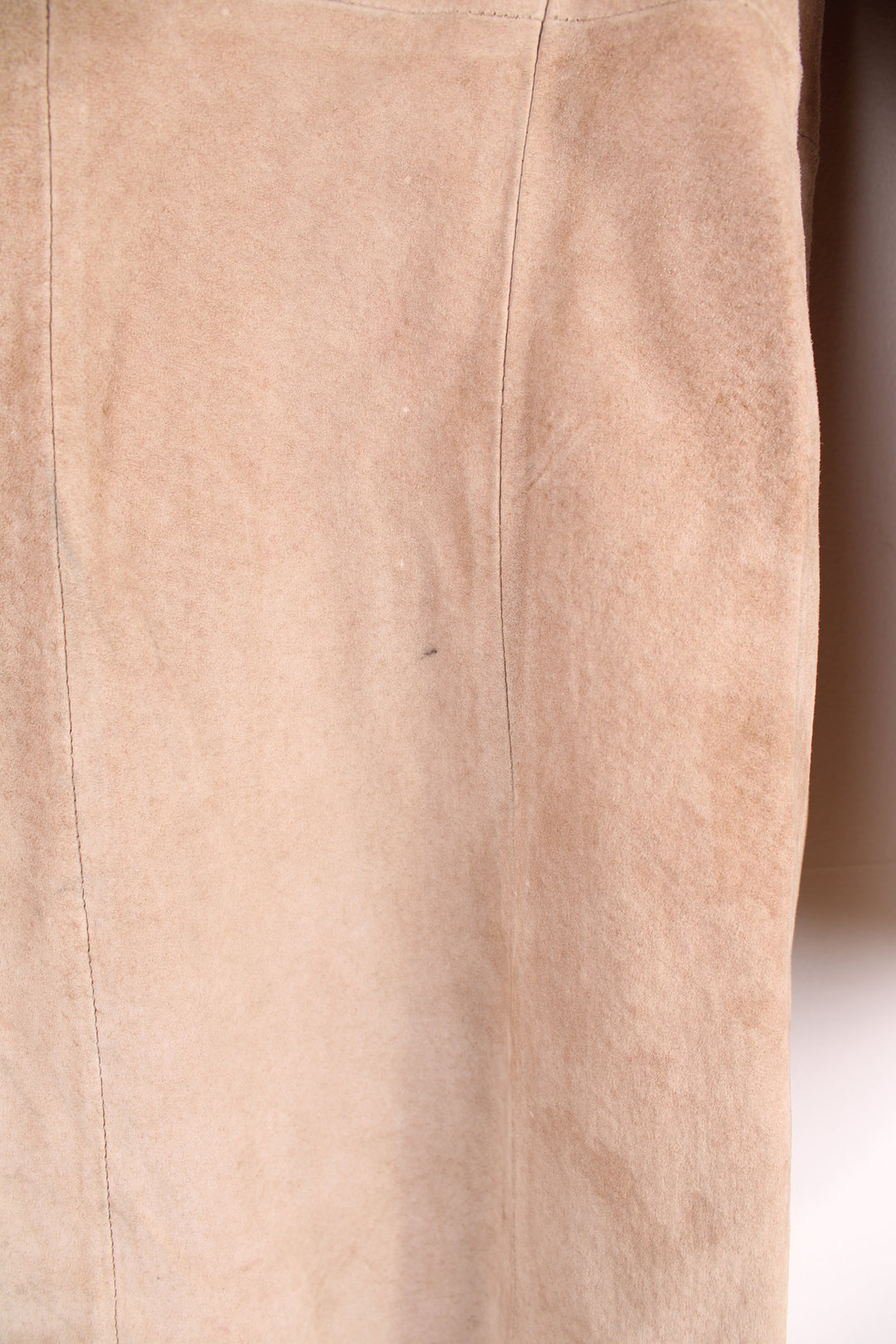 Y2K style tan suede floor length Afghan coat, features hook and eye closures and faux fur trim
