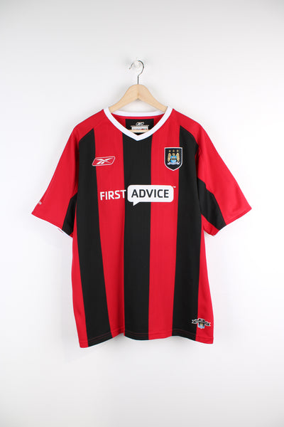 Vintage Manchester City 2003/04, Reebok Away Football Shirt, red, black and white colourway, v neck, has embroidered logos on the front. 