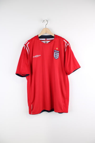 Vintage England 2004/06, Umbro Away Football kit, red colourway, and has embroidered logos on the front. 
