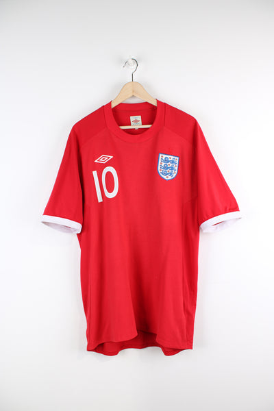 Vintage England 2010/11, Umbro Away Football kit, red and white colourway, Wayne Rooney number 10 printed on the back, and has embroidered logos on the front. 
