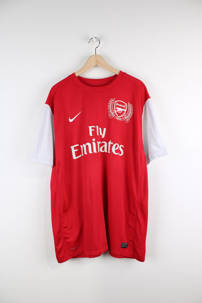Vintage Arsenal 2011/12, Nike home football shirt, red and white team colourway, with logos printed on the front and back. 
