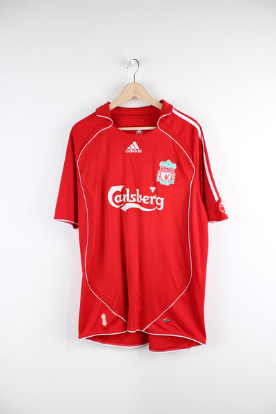 Vintage Liverpool 2006/08, Adidas Home Football Shirt, red and white team colourway, collar, Carragher number 23 printed on the back, and has logos embroidered on the front. 