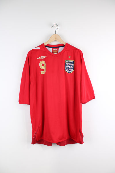 Vintage England 2006/08, Umbro Away Football kit, red and gold colourway, Wayne Rooney number 9 printed on the back, and has embroidered logos on the front. 