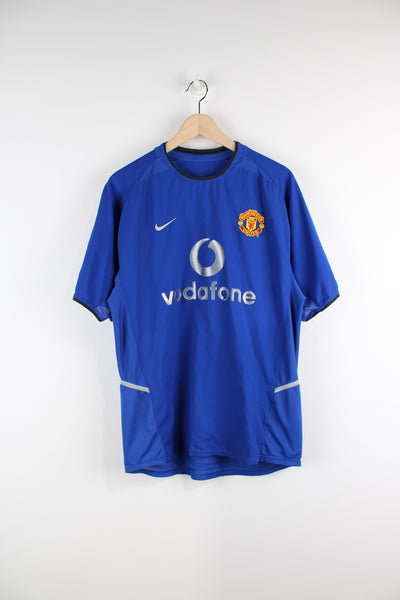 Vintage Manchester United 2002/04, Nike Away Football Shirt, blue colourway, David Beckham number 7 printed on the back, and has logos embroidered on the front. 