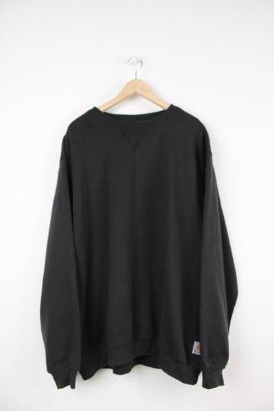 Vintage Carhartt original fit all black crewneck sweatshirt with logo on the hem
