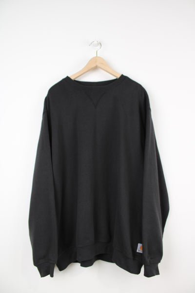 Vintage Carhartt original fit all black crewneck sweatshirt with logo on the hem