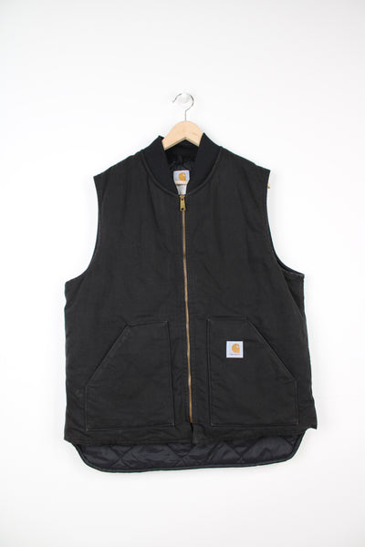 Carhartt all black heavy duty cotton workwear gilet, with quilted lining and embroidered logo on the pocket