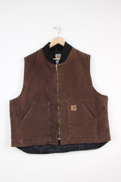 Carhartt brown heavy duty cotton workwear gilet, with quilted lining and embroidered logo on the pocket 