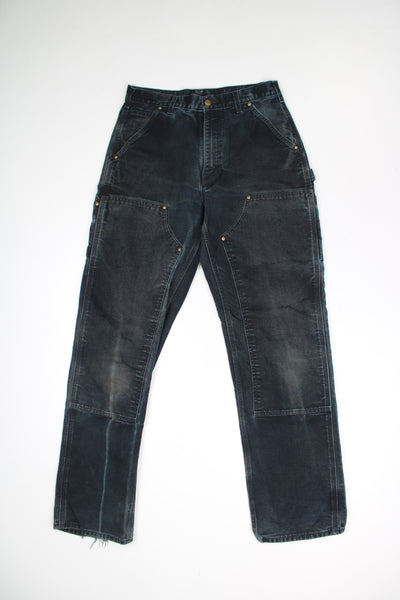 Carhartt black jeans with a relaxed carpenter style fit and double knee patches